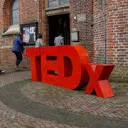 Logo van TEDx Harderwijk